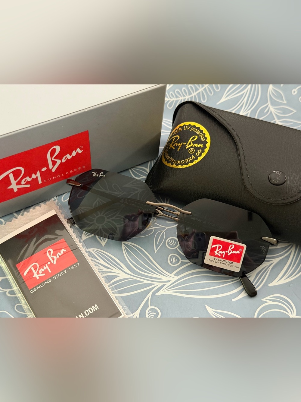 Ray-Ban Men's Black Rimless Sunglasses with Gunmetal Bridge
